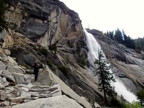 Climbing rock steps next to Nevada Falls