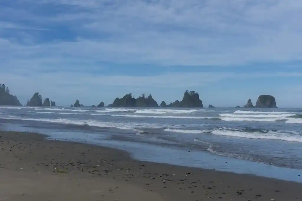 The view of Point of the Arches from Shi Shi Beach. A complete guide to hiking and camping at Shi Shi Beach.