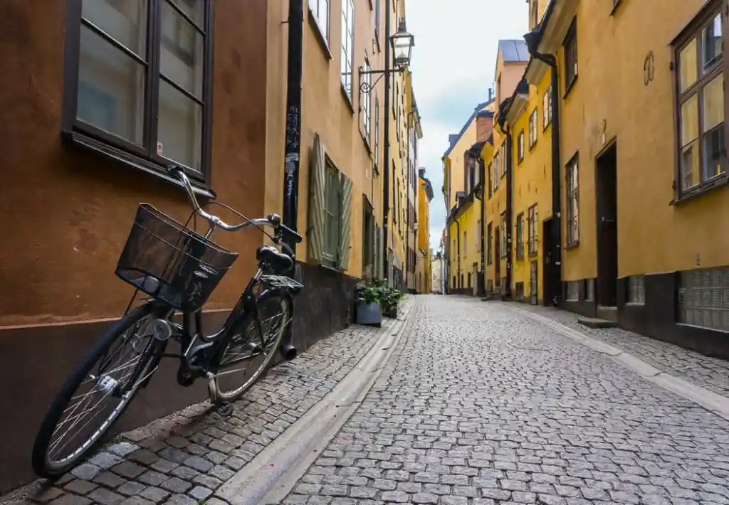Prastgatan street in Stockholm's old town. 30 photos of Stockholm that will inspire you to visit.