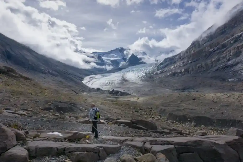 Hiking near the Robson Glacier at Berg Lake. The Ultimate Guide to Hiking the Berg Lake Trail in Mount Robson Provincial Park in the Canadian Rockies