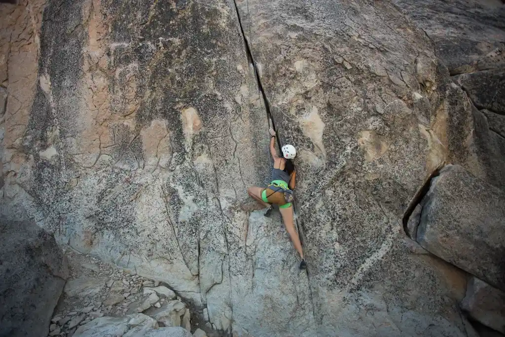 A woman rock climbing