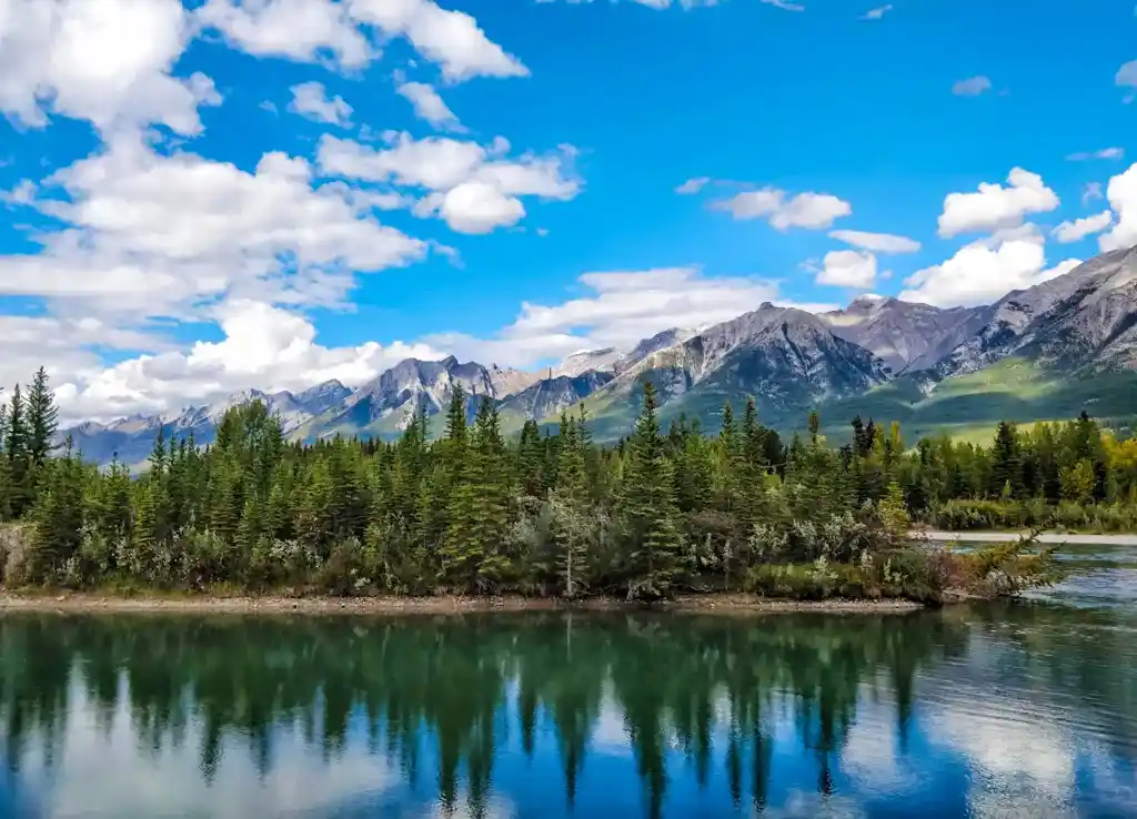 View of the Bow River from the Spur Line Trail near Canmore Alberta - one of the best small towns in Canada for outdoor adventures