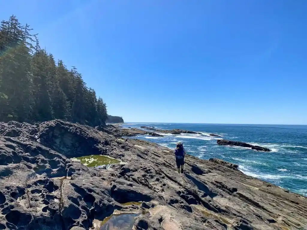 Scrambling across the rocks at Sandstone Point