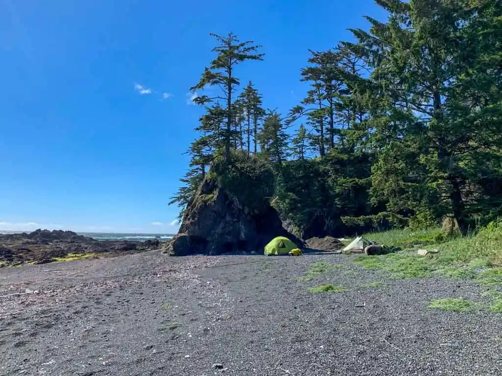 Camping next to a sea stack