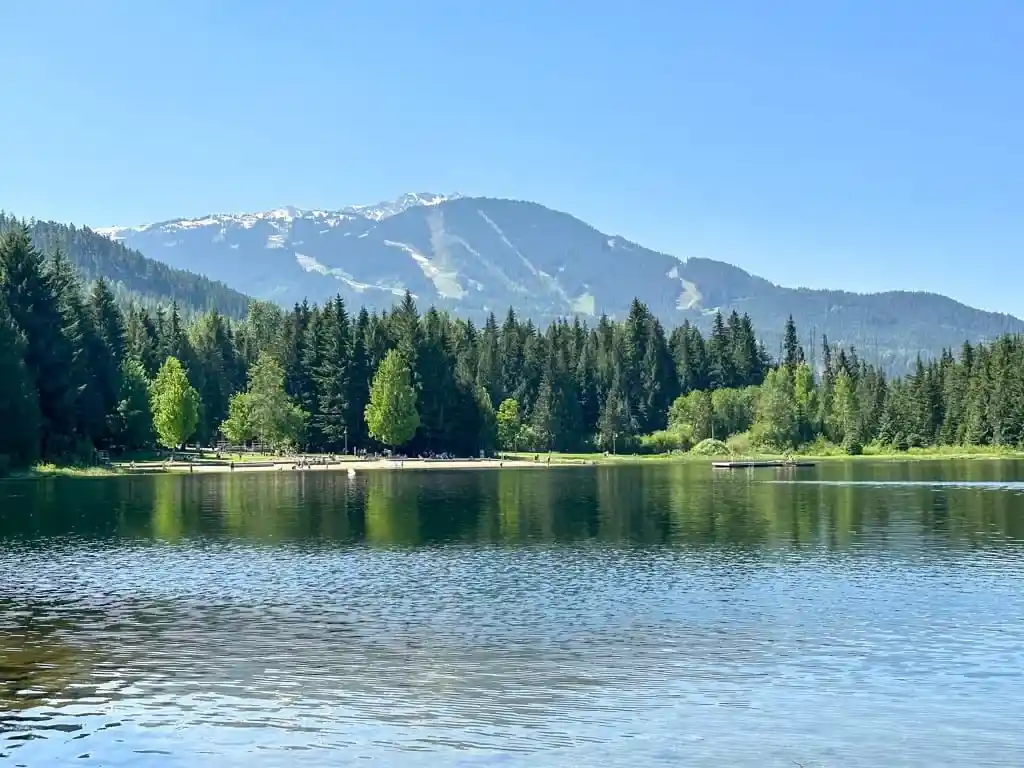 The beach at Lost Lake with mountains behind