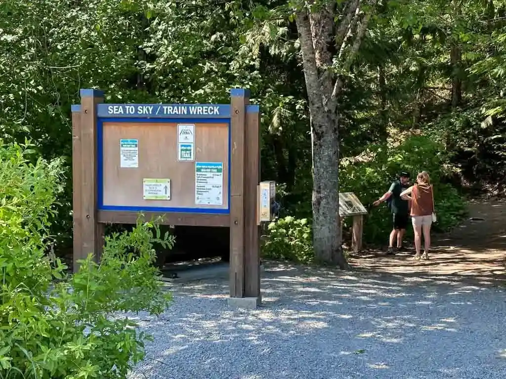 Signs at the trailhead for the Train Wreck trail