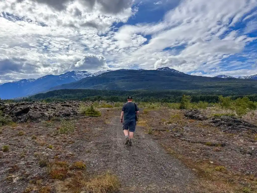 Walking through the lava towards the tree cast