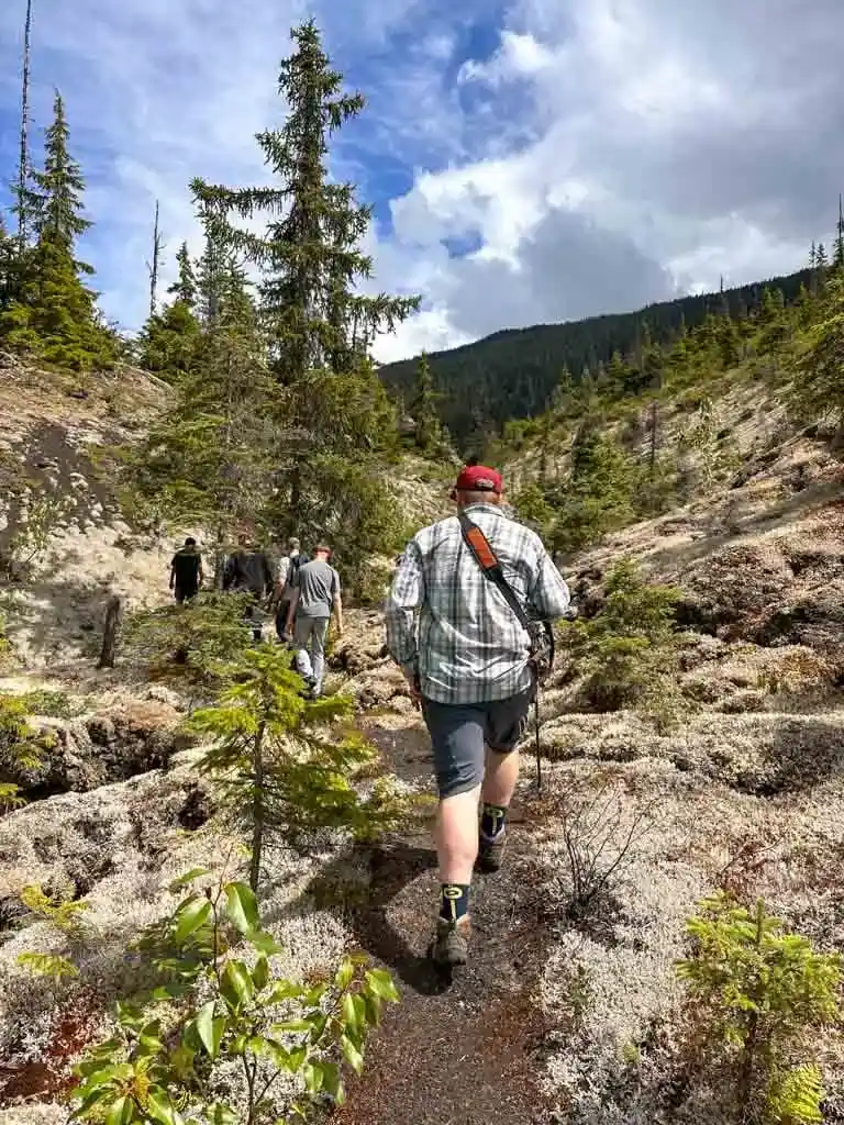 Hiking through lava on the way to Tseax Cone in Nisga'a Memorial Lava Bed Provincial Park