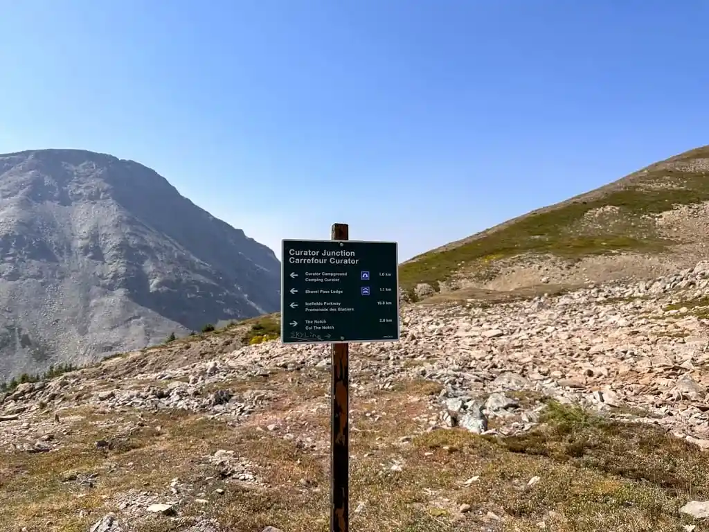Trail sign at Curator Junction
