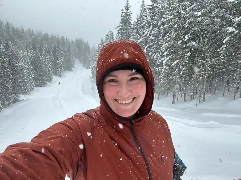 Taryn wears the Outdoor Vitals Vario Jacket while snow tubing at the Sea to Sky Gondola in Squamish