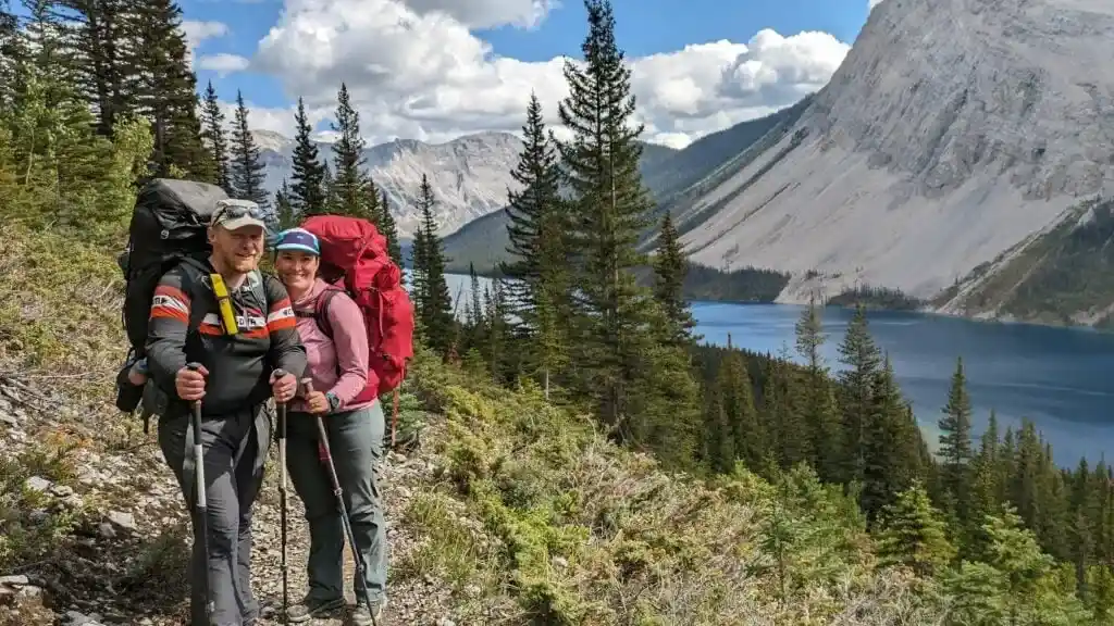 Two hikers on the trail above Marvel Lake