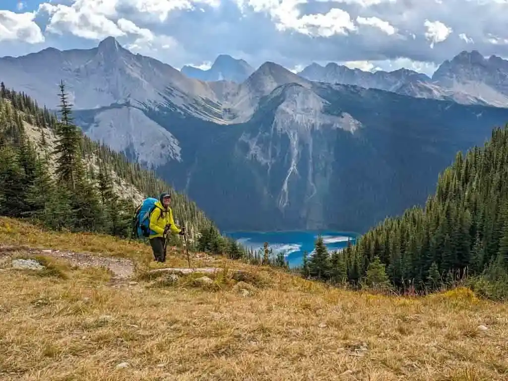A hiker on the Wonder Pass Trail above Marvel Lake