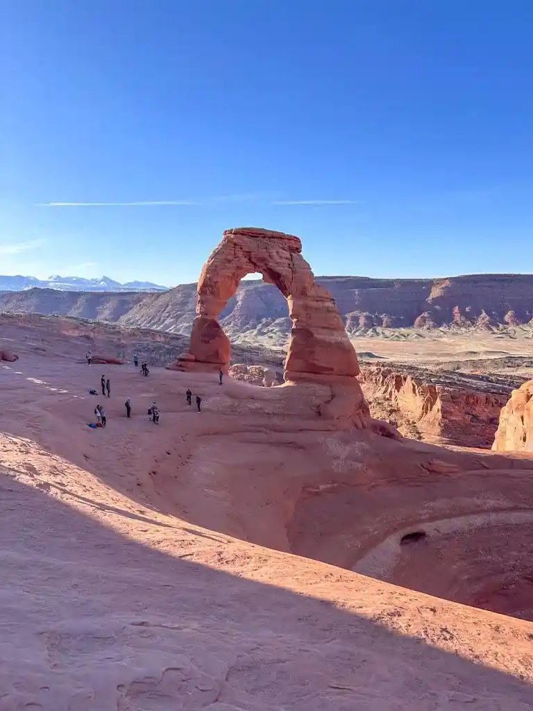 Delicate Arch in Arches National Park in early morning shadows