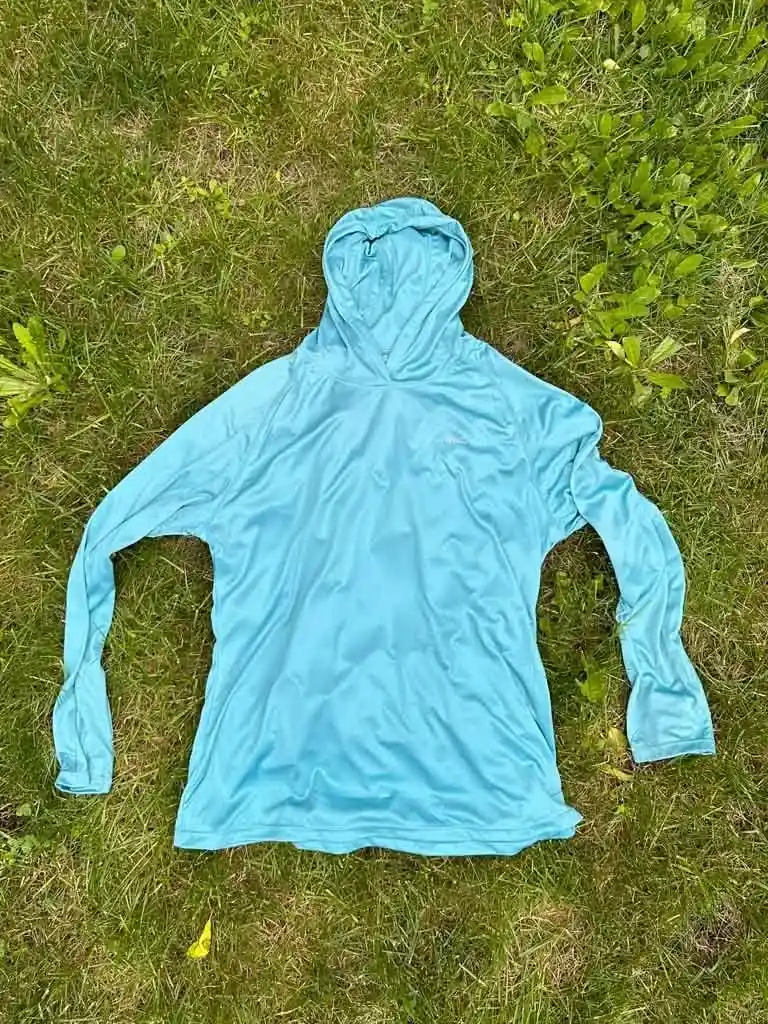 The Willit sun hoodie from Amazon laid flat on grass