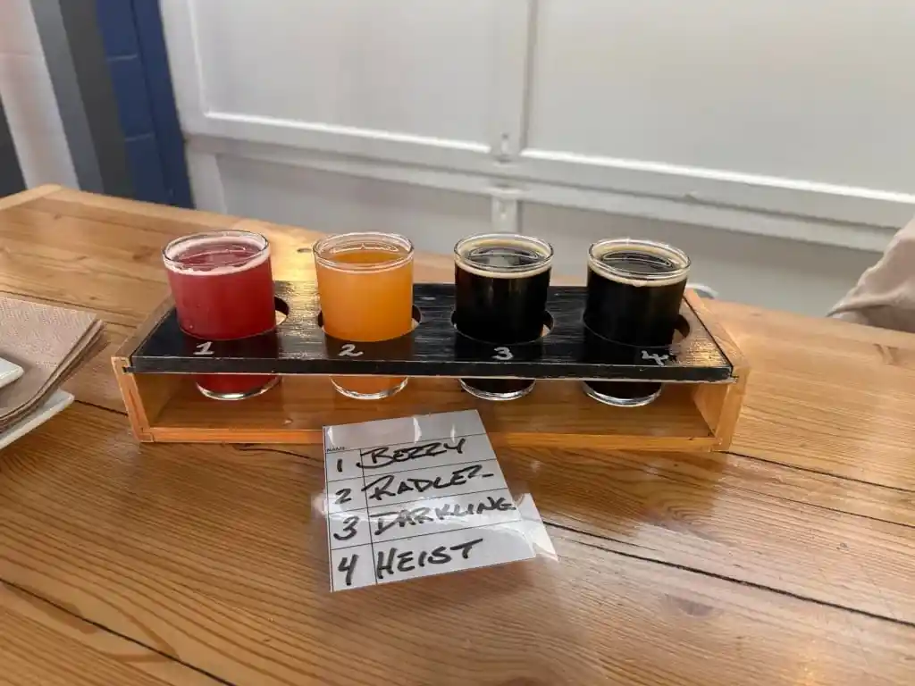 A flight of four small glasses of craft beer at Cannery Brewing.